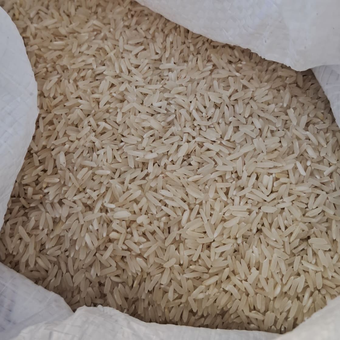 برنج سفید 386 پاکستانی رزاق وزن 10 کیلوگرم — تصویر ۴