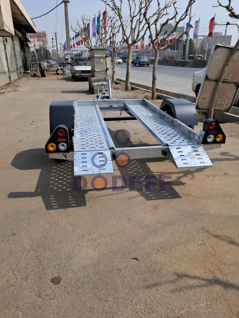 یدک کش موتور چهارچرخ (تریلر) پشت ماشین دودف — تصویر ۲