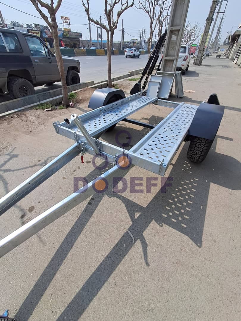 یدک کش موتور چهارچرخ (تریلر) پشت ماشین دودف — تصویر ۳