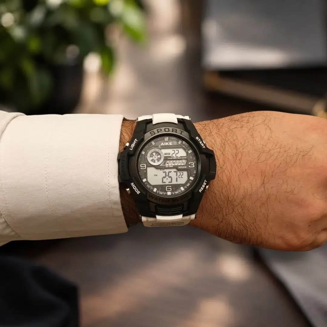ساعت مچی اسپرت آیک | AIKE طرح G-SHOCK دیجیتالی مدل AK-1856 رنگ مشکی بند سفید به همراه جعبه و پاکت اورجینال — تصویر ۲