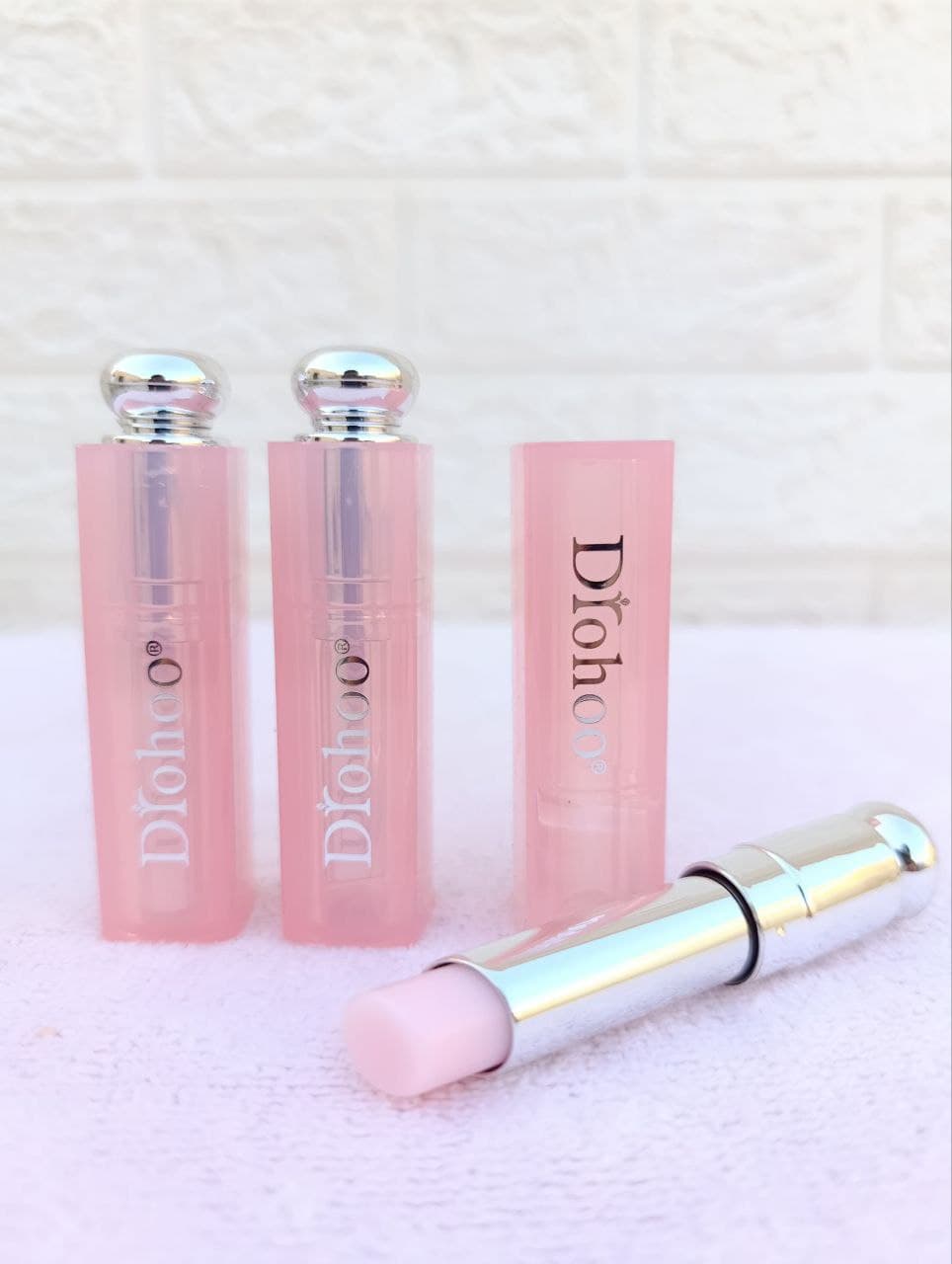 بالم لب حرارتی Drohoo طرح دیور – آبرسان، تغییررنگدهنده و براقکننده لب — تصویر ۴