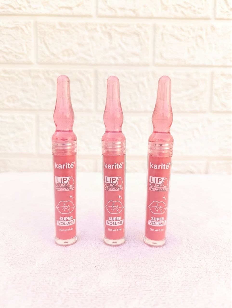 حجم‌دهنده و براق‌کننده لب کاریتـه | Lip Plumper با بسته‌بندی آمپولی و اثر فوری — تصویر ۷