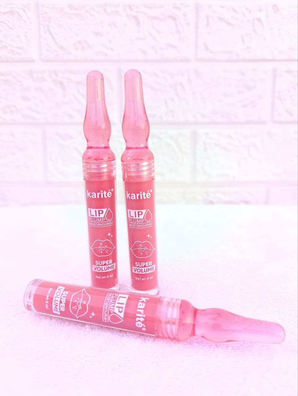 حجم‌دهنده و براق‌کننده لب کاریتـه | Lip Plumper با بسته‌بندی آمپولی و اثر فوری — تصویر ۵