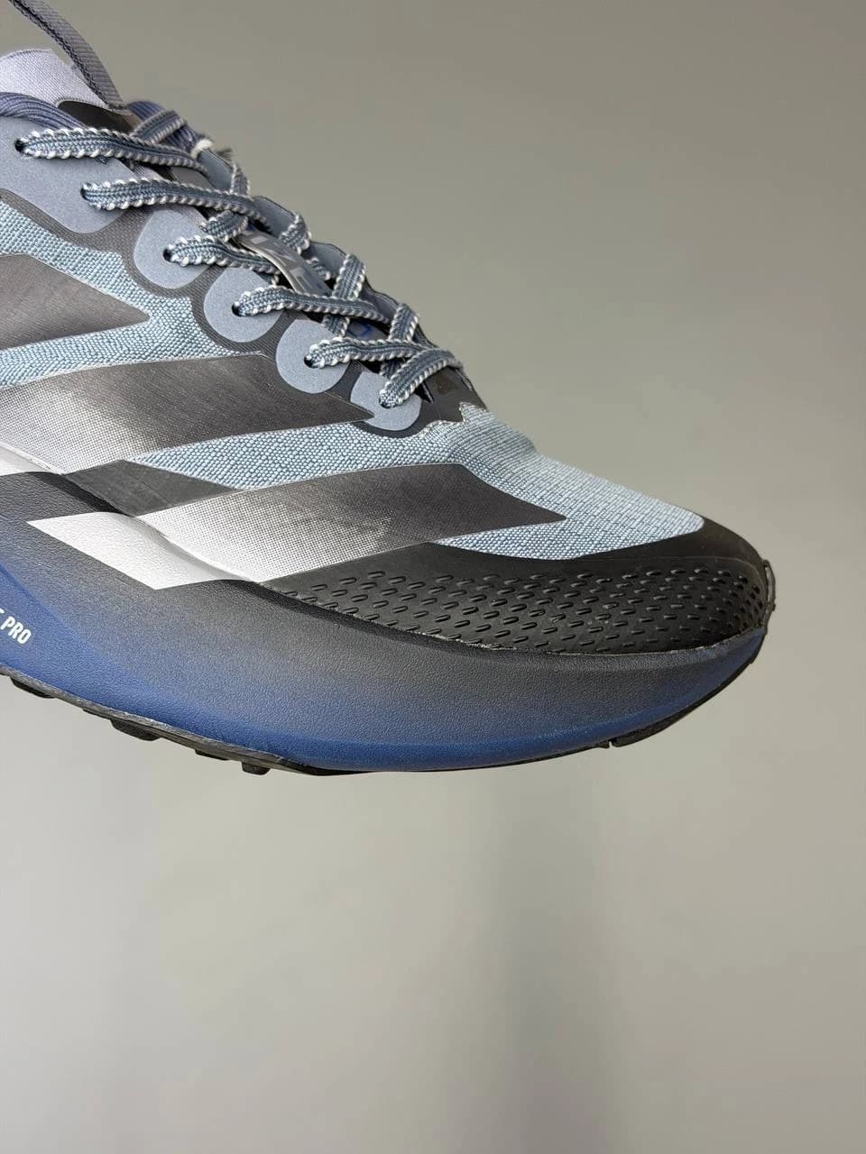 کتونی آدیداس آدی زیرو اوو اس ال ای تی آر آبی توسی adidas Adizero Evo Sl ATR Blue Gray — تصویر ۶