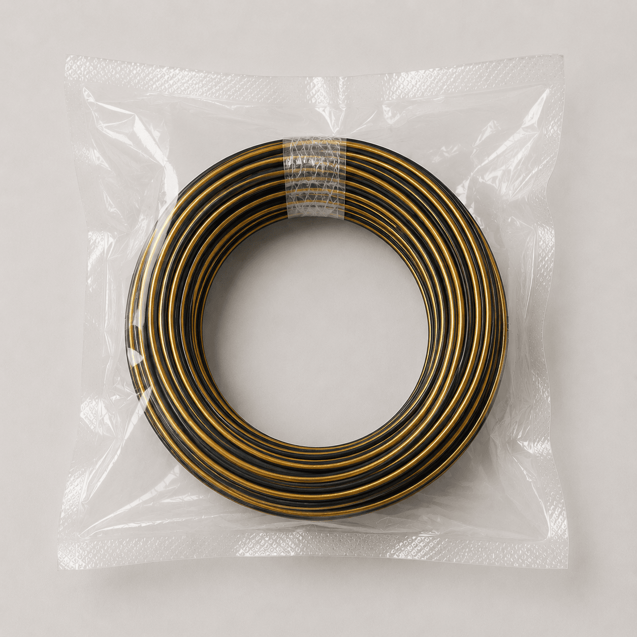 فیلامنت PLA ابریشمی دو رنگ مشکی-طلایی قطر 1.75mm (200 گرمی رول شده شرکتی)