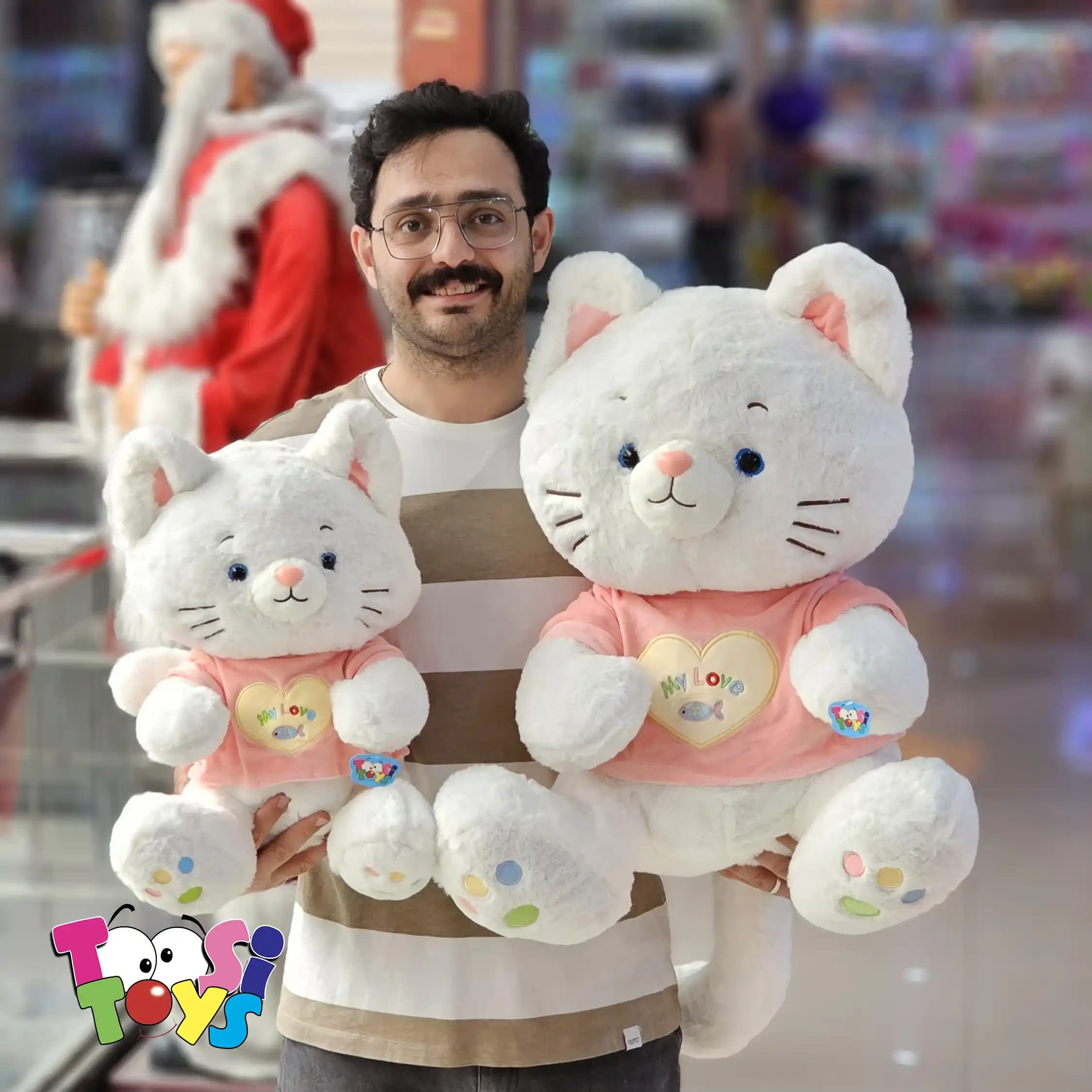 عروسک گربه نشسته لباس دار — تصویر ۳