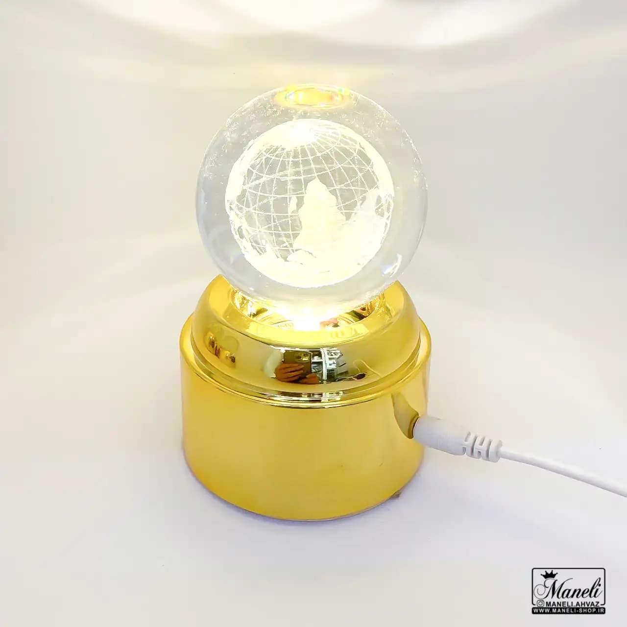 گوی کریستالی چرخان و چراغدار usb با پایه طلایی — تصویر ۴