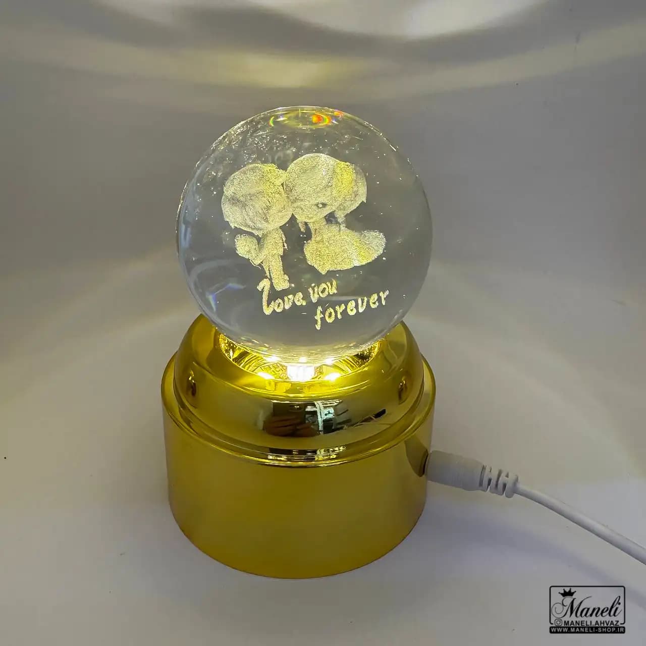 گوی کریستالی چرخان و چراغدار usb با پایه طلایی — تصویر ۲