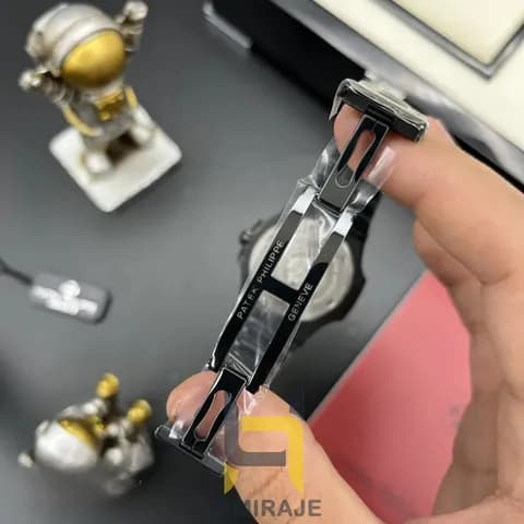 ساعت مردانه پتک فیلیپ پتک فیلیپ با صفحه تیفانی و بند استیل مشکی — تصویر ۷