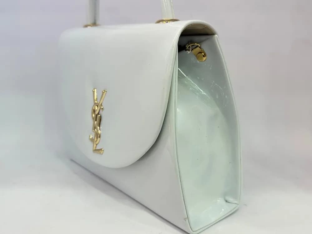کیف دستی زنانه مجلسی مدل ورنی براق با لوگوی ysl — تصویر ۲