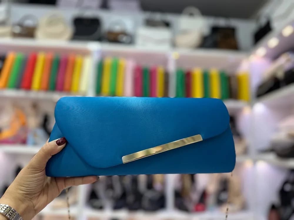 کیف مجلسی زنانه مدل کتابی با یراق طلایی رنگ آبی — تصویر ۷
