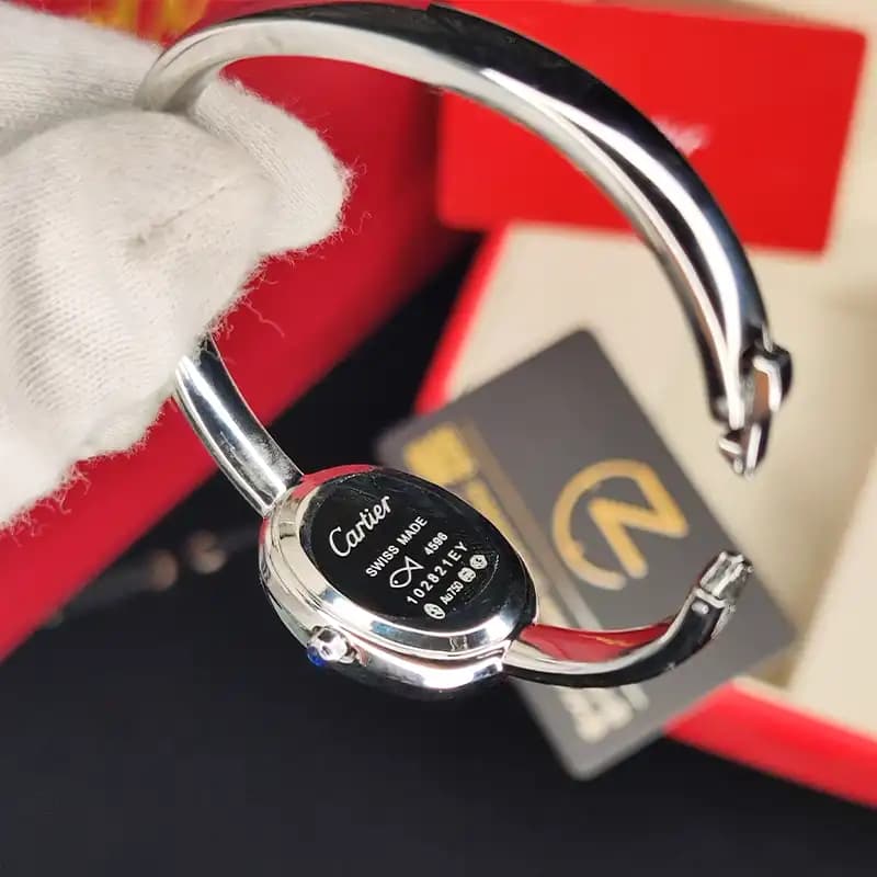 ساعت مچی زنانه کارتیر باگنور بند فلزی (النگویی) نقره‌ای Cartier Baignoire Silver — تصویر ۹