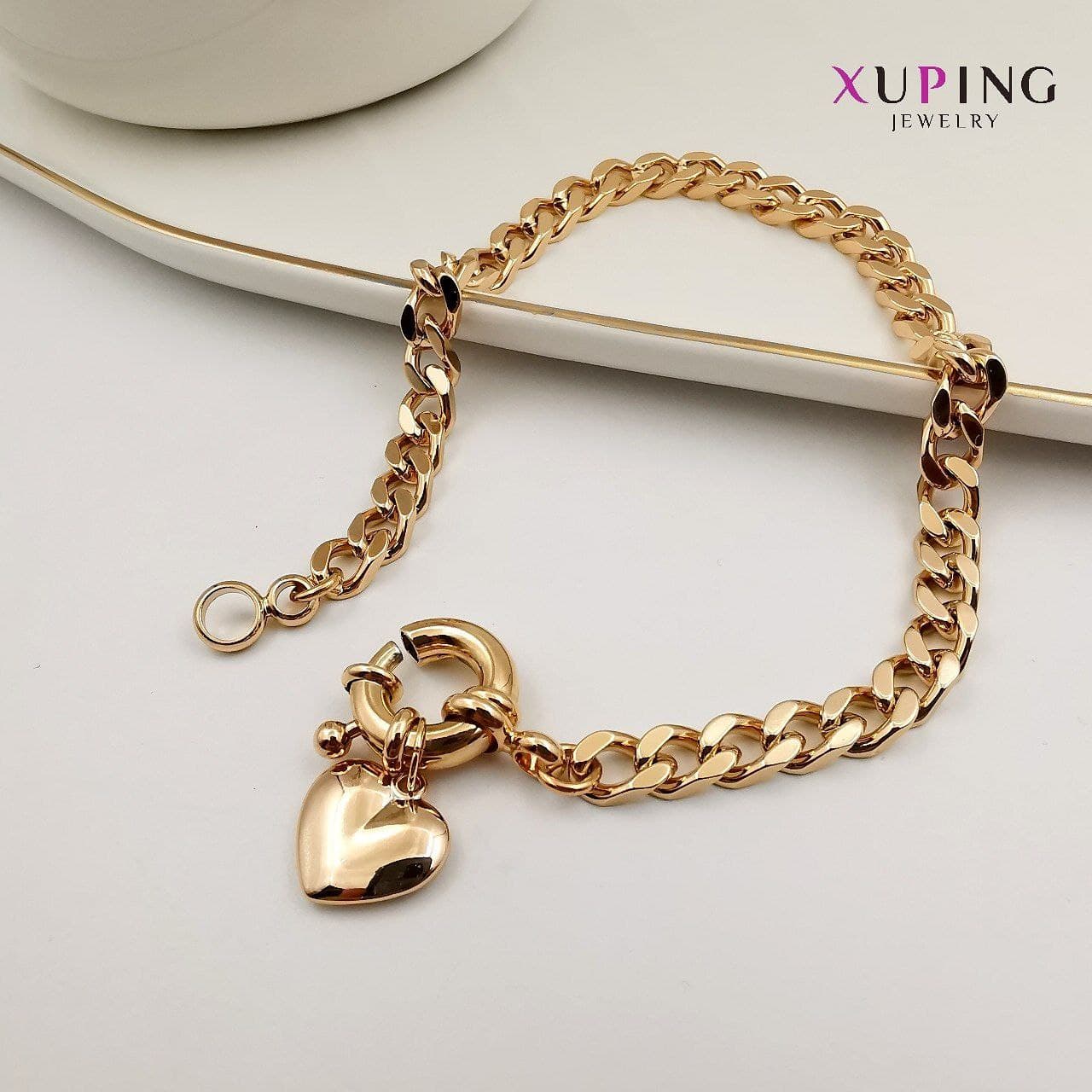 دستبند زنانه ژوپینگ مدل کارتیر با آویز قلب کد B1067