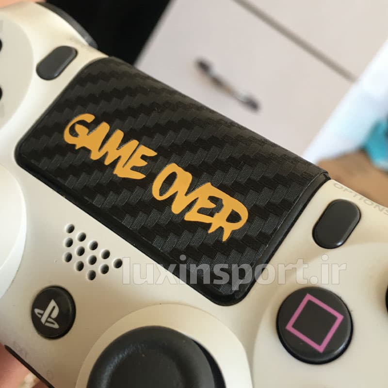 برچسب محافظ تاچ پد دسته ps4 طرح GAME OVER – مشکی کربن طلایی – بسته 2 عددی — تصویر ۱۰