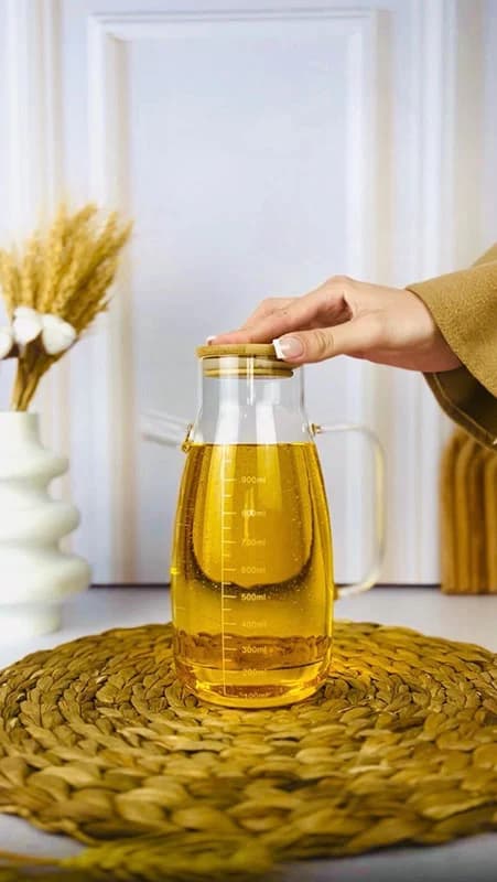 روغن‌ریز پیرکس وارداتی درب بامبو | بطری شیشه‌ای شعله‌مستقیم ۱۰۰۰ میل ضد نشت