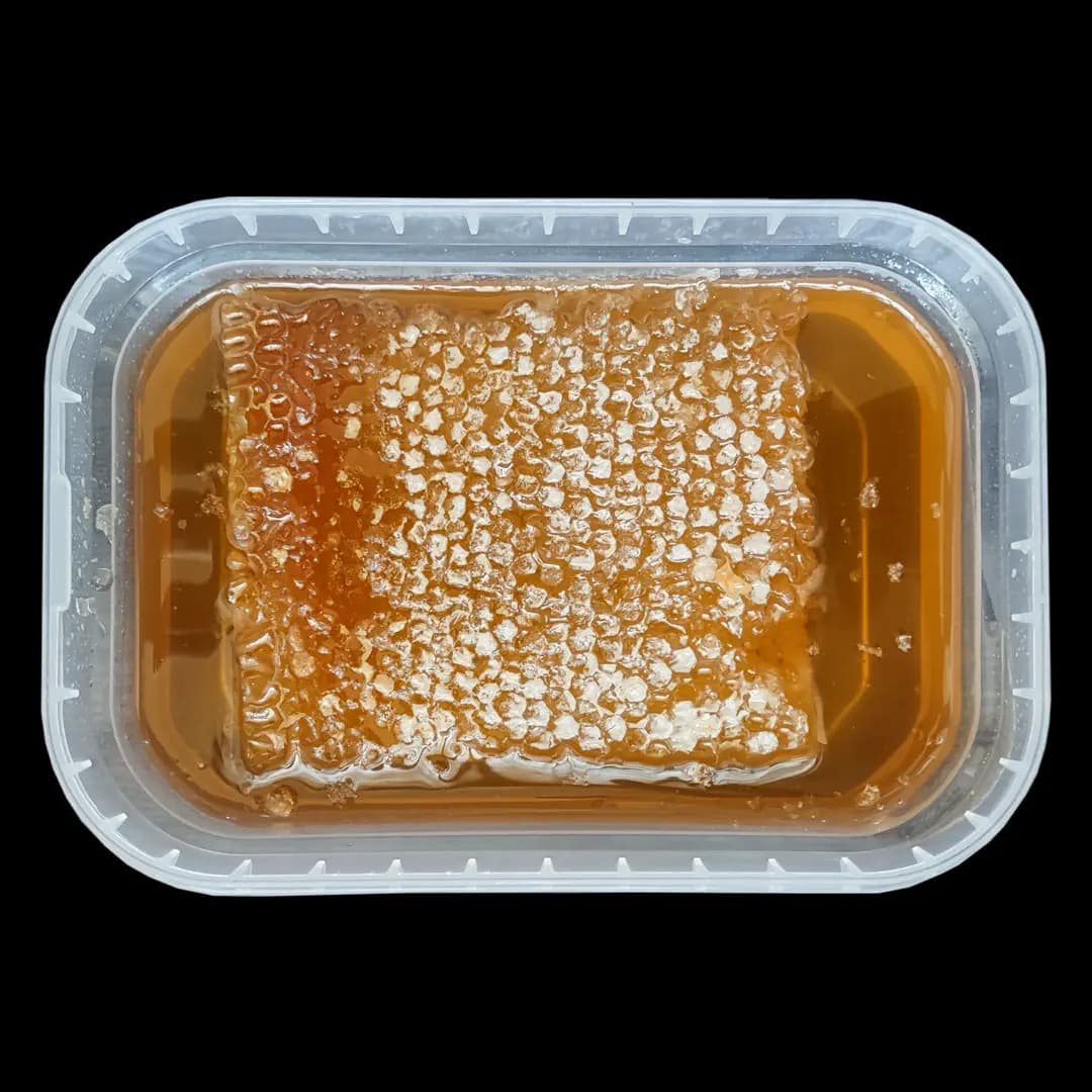 عسل موم دار فروردین | 700 گرمی — تصویر ۱۰
