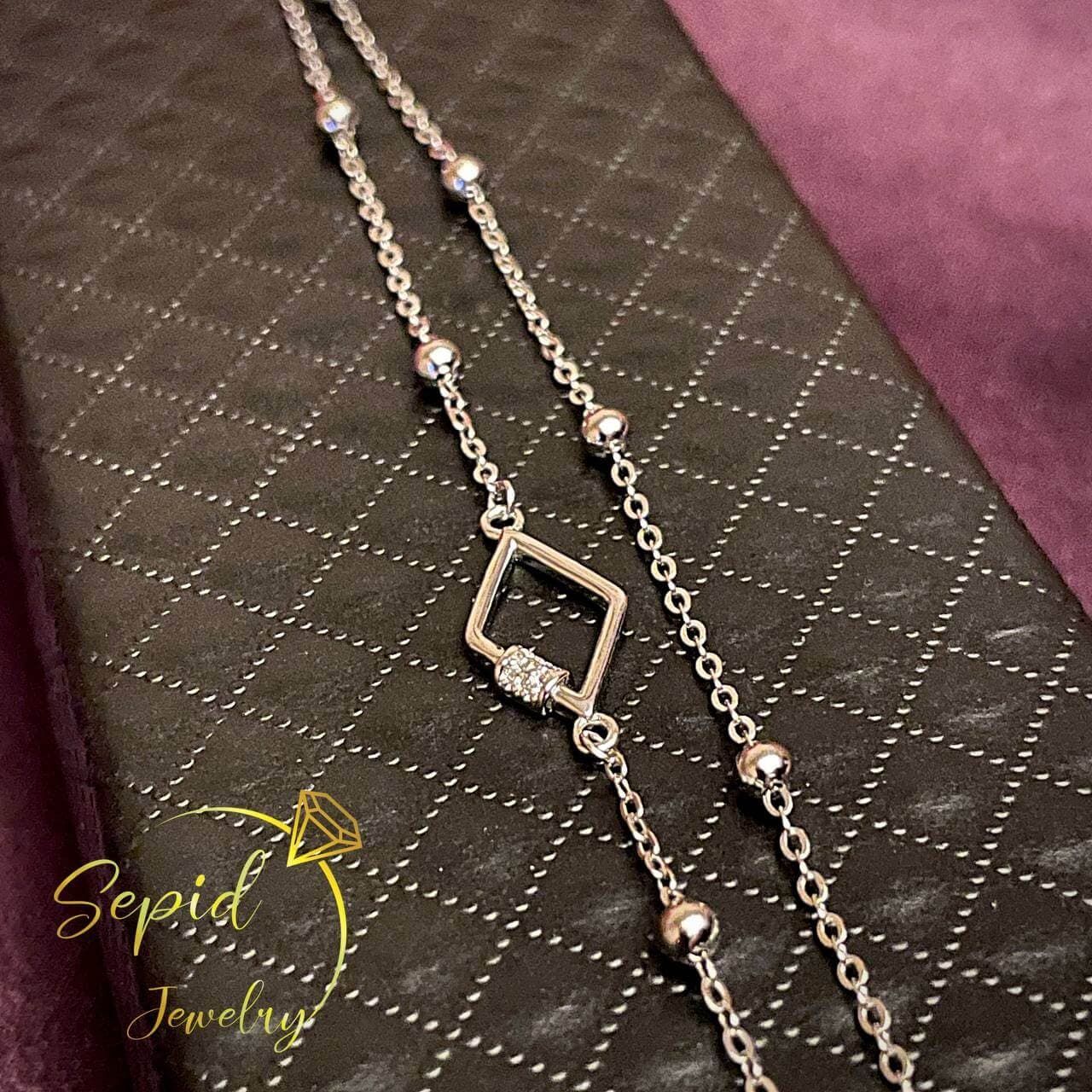 دستبند نقره دو رج لوزی و گوی