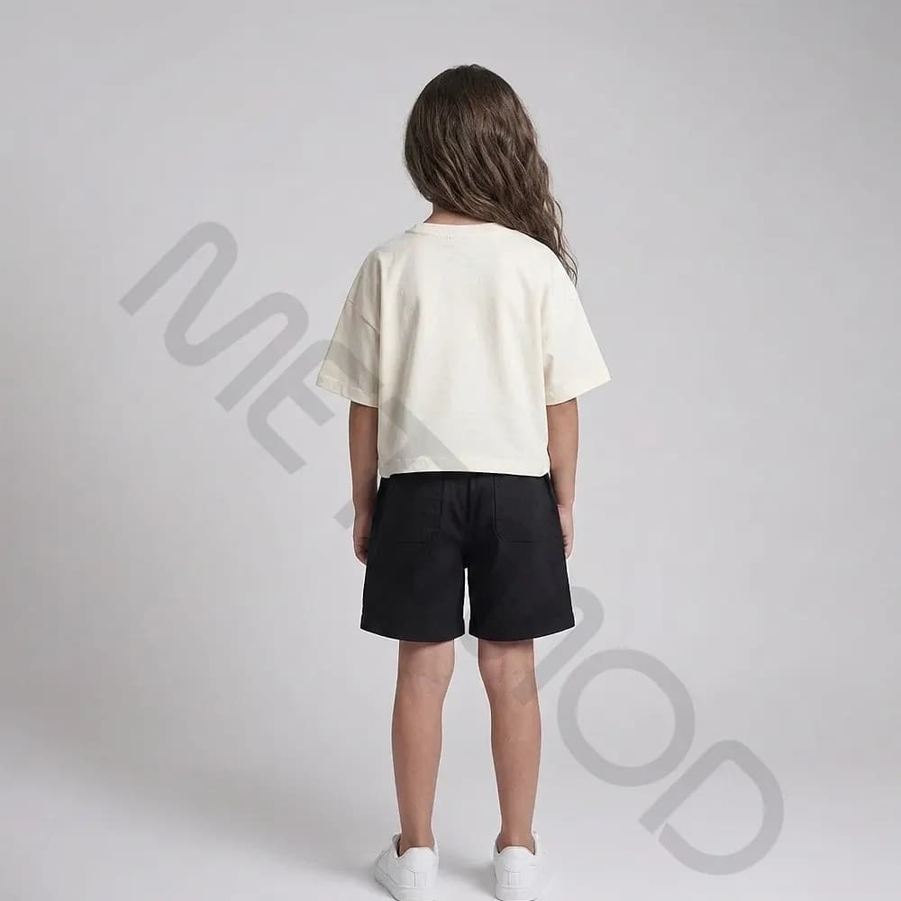ست کراپ شلوارک دخترانه مدل قلب پروانه ای کرم مشکی سایز 5,50,55,60 — تصویر ۳