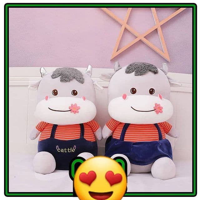 عروسک گاو گل به دهن