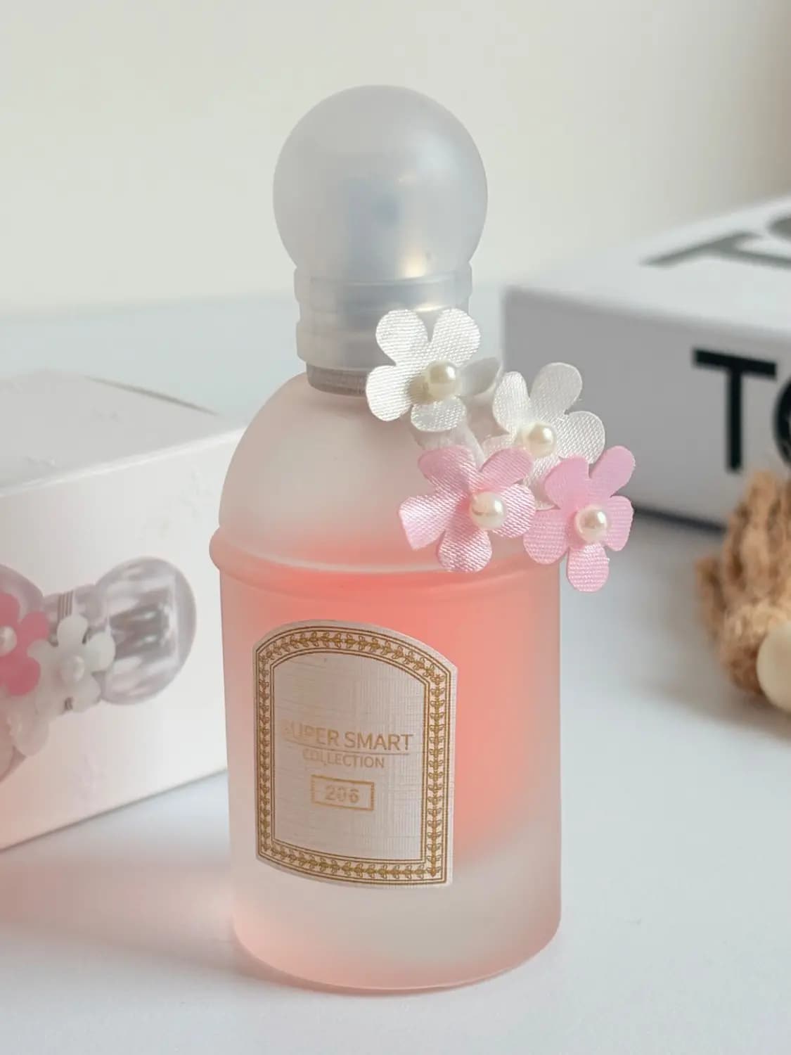 عطر ادکلن مینی گرلن چری بلوسوم زنانه (سوپر اسمارت) | Guerlain Cherry Blossom (Super Smart Collection) حجم 25 میل(شرکتی) — تصویر ۵
