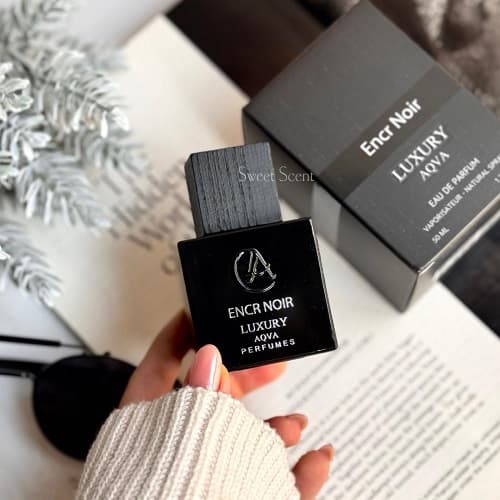 عطر ادکلن لالیک مشکی(چوبی) انکر نویر (لاکچری آکوا) | Lalique Encre Noire (Luxury Aqva) حجم 50 میل(شرکتی) — تصویر ۵