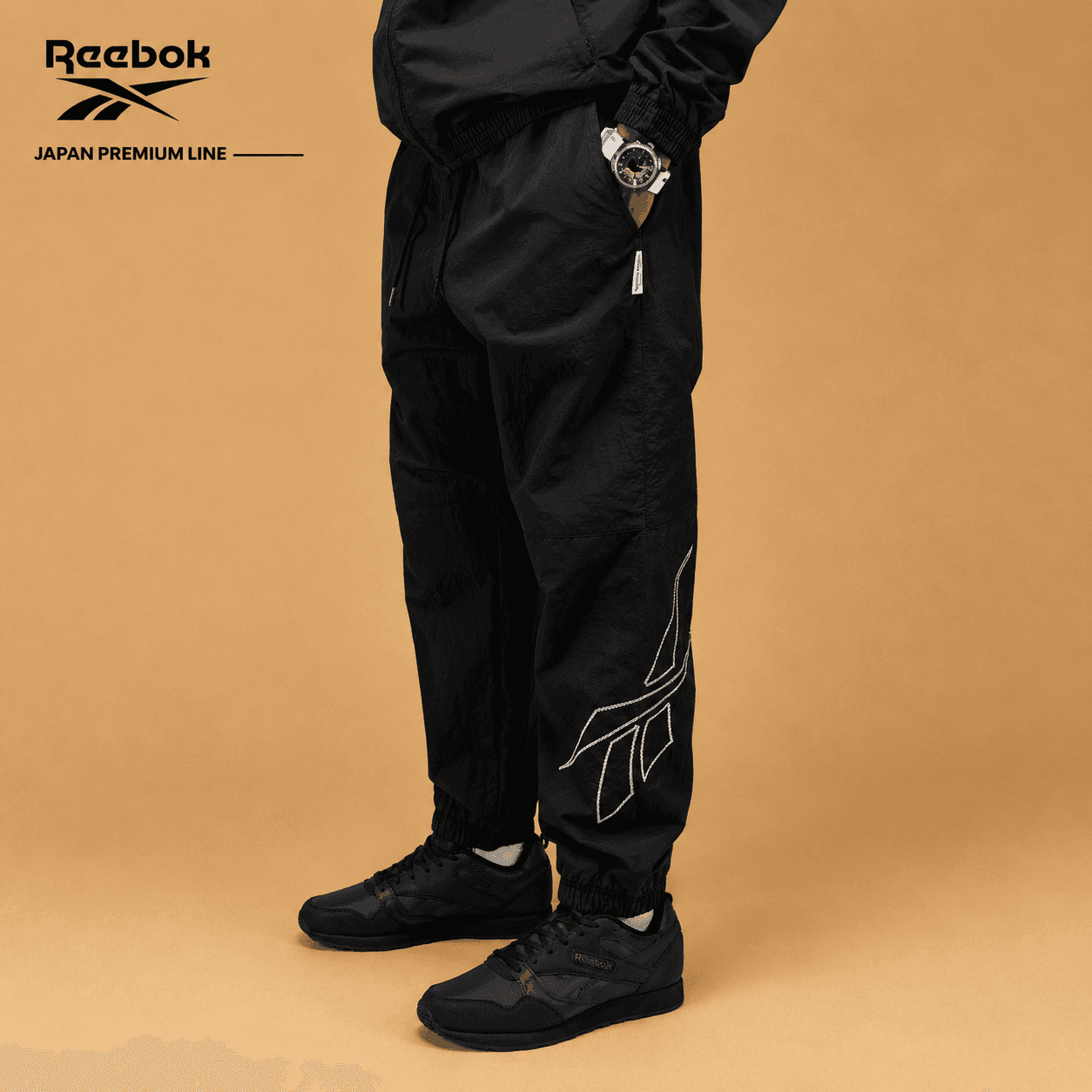 شلوار مردانه ریباک مدل Reebok Versatile Loose-Fit Woven Casual Sports Pants 200157