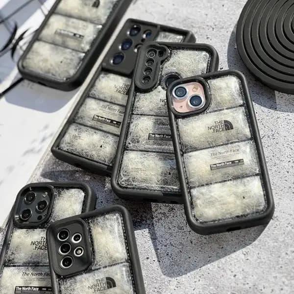 قاب Puffer Ice برند North Face برای IPhone 14 Promax — تصویر ۴