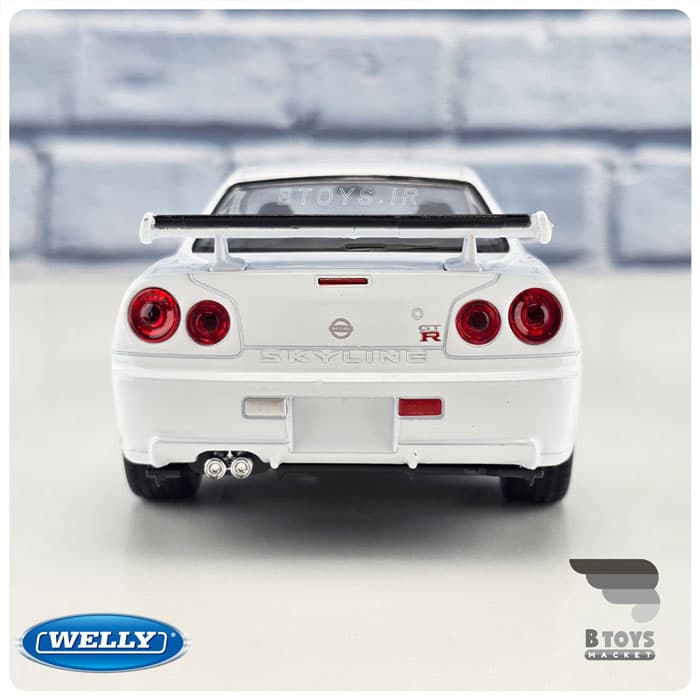 ماکت نیسان اسکای لاین آر 34 سفید ویلی(Nissan Skyline GT R (R34) welly)مقیاس:1/24 — تصویر ۵
