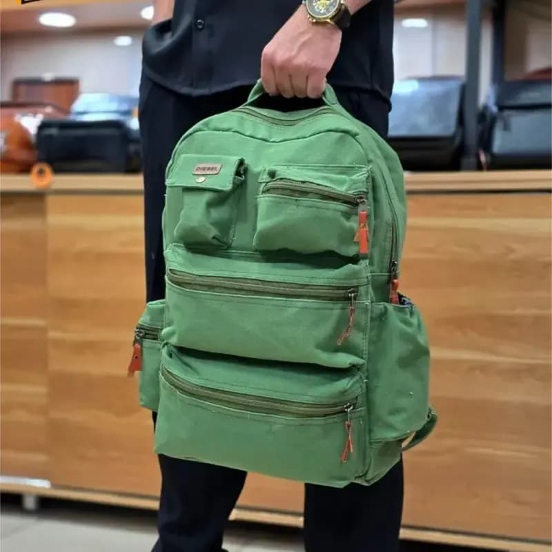 کوله پشتی برزنتی اسپرت مناسب خانم ها و آقایان جنس خارجی ابعاد 44x30x13 سانتی متر — تصویر ۵