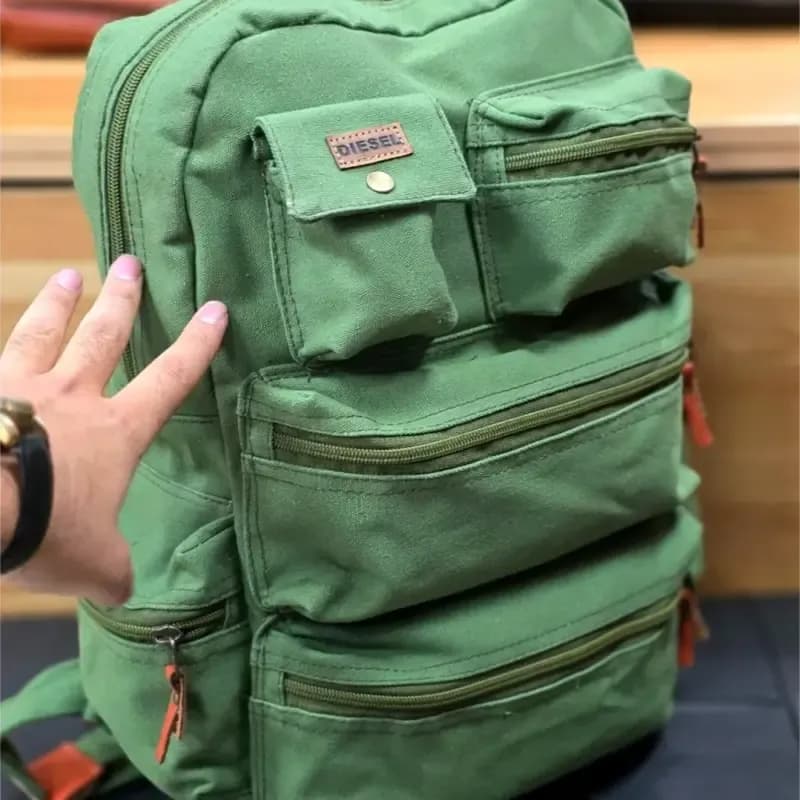 کوله پشتی برزنتی اسپرت مناسب خانم ها و آقایان جنس خارجی ابعاد 44x30x13 سانتی متر — تصویر ۷