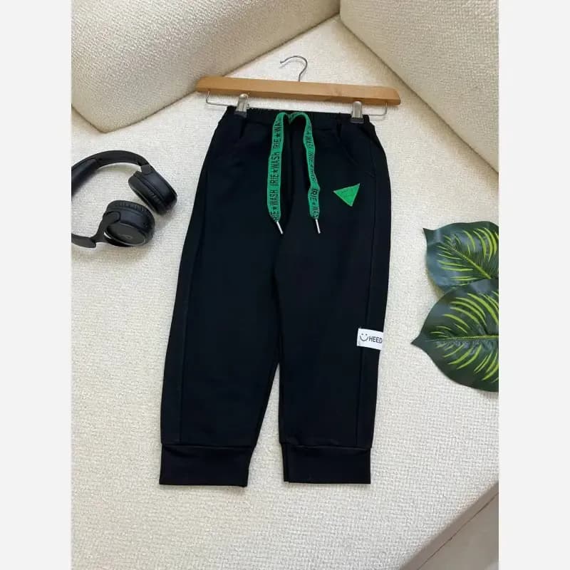 شلوار اسلش بچگانه وارداتی مشکی دورس مناسب 3 تا 8 سال سایز 110 تا 170 — تصویر ۵