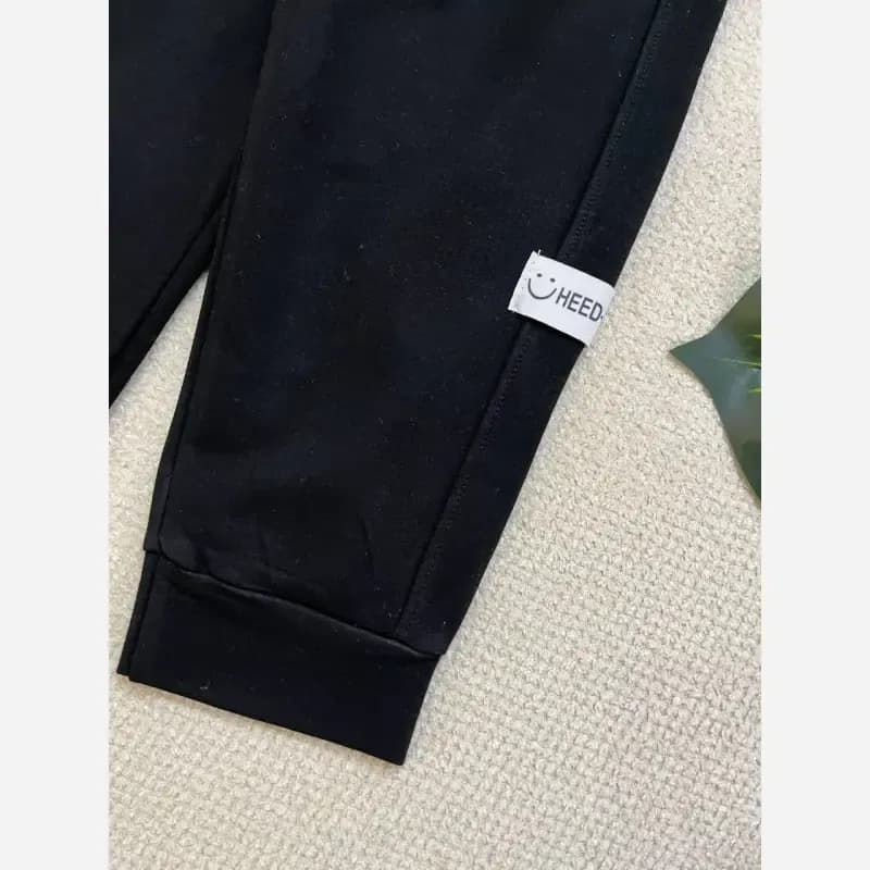 شلوار اسلش بچگانه وارداتی مشکی دورس مناسب 3 تا 8 سال سایز 110 تا 170 — تصویر ۴