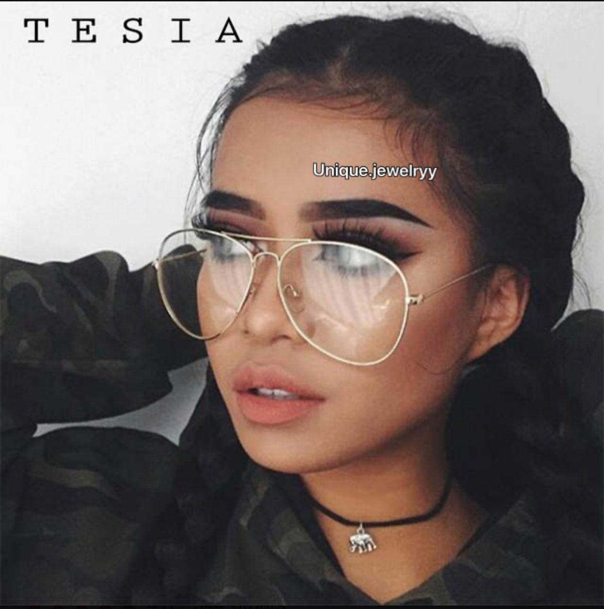 عینک فریم شیشه ای طرح ری بن رنگ نقره ای — تصویر ۲