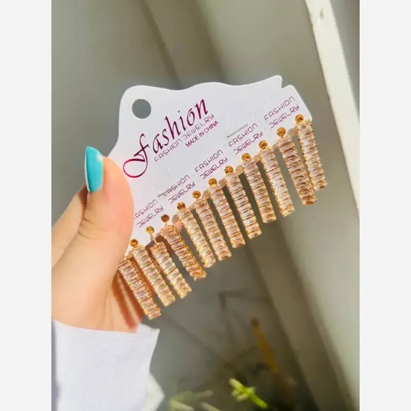 گوشواره دخترانه مدل تنیسیرنگ طلایی از جنس رادیوم — تصویر ۲