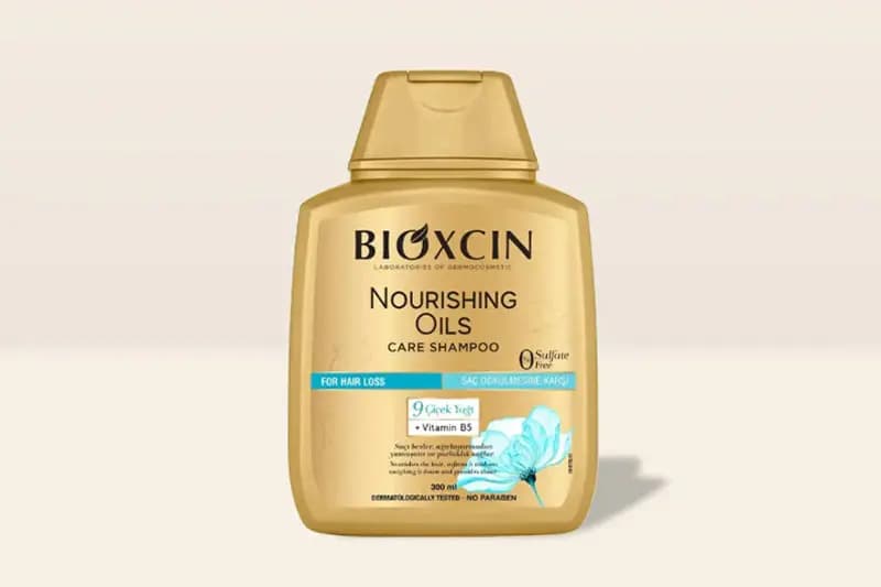 شامپو تقویت و ترمیم کننده مو بیوکسین مدل Nourishing Oils Care روغن 9 گیاه 300 میل اورجینال — تصویر ۴