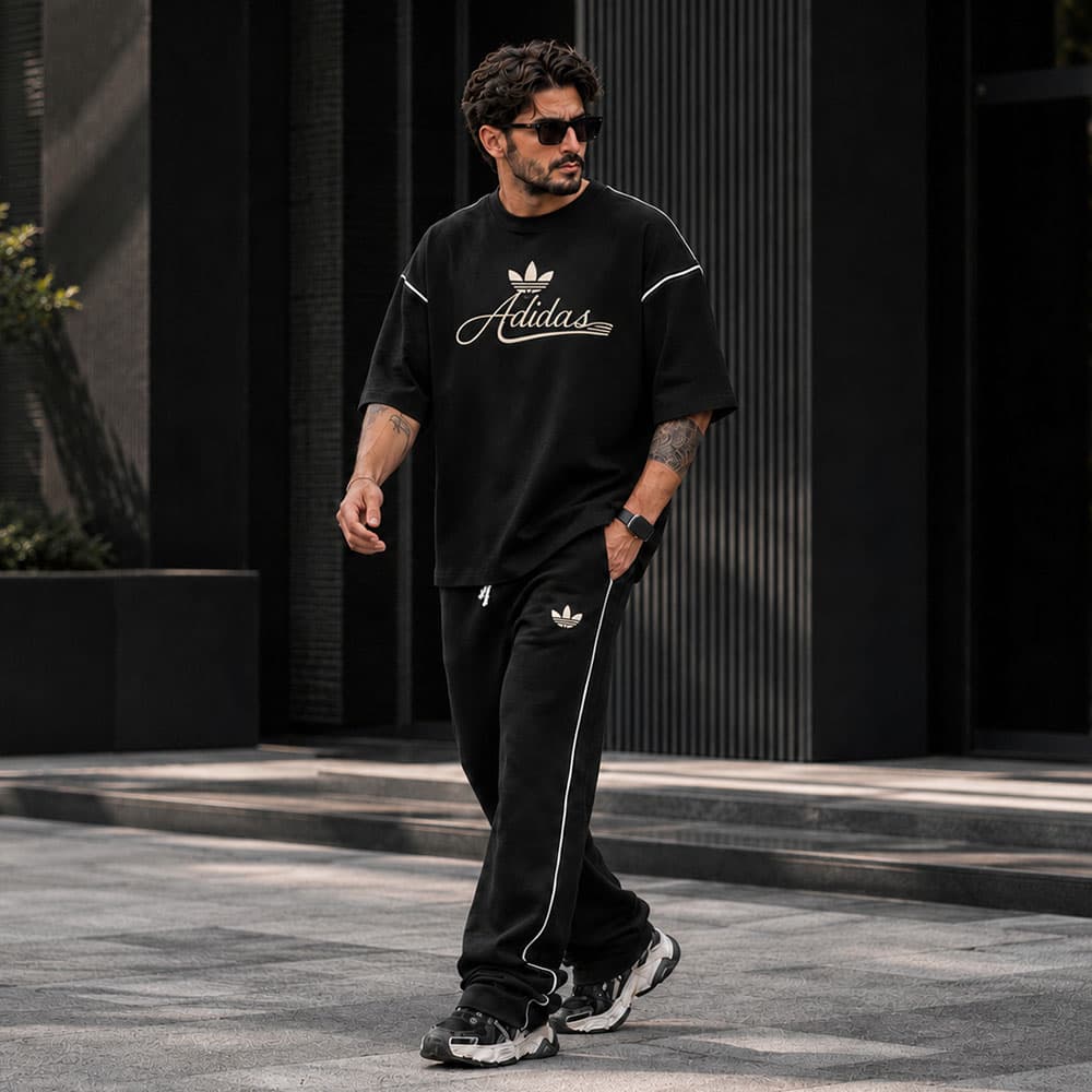 ست تیشرت و شلوار مردانه طرح adidas خط‌دار | رنگ مشکی