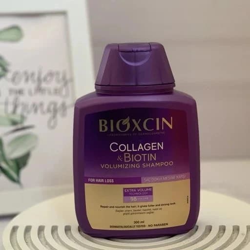 شامپو bioxسین بنفش ضد ریزش و حجم دهنده کلاژن و بیوتین حجم 300 میلی(واردات قانونی از منطقه آزاد ارس)