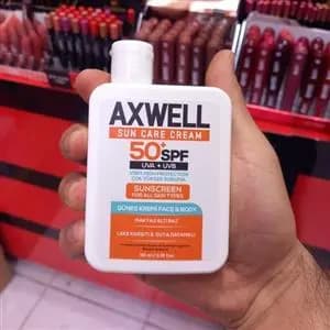 ضدآفتاب ضدلک آکسول اس پی اف 50 حجم 100 میل AXWELL