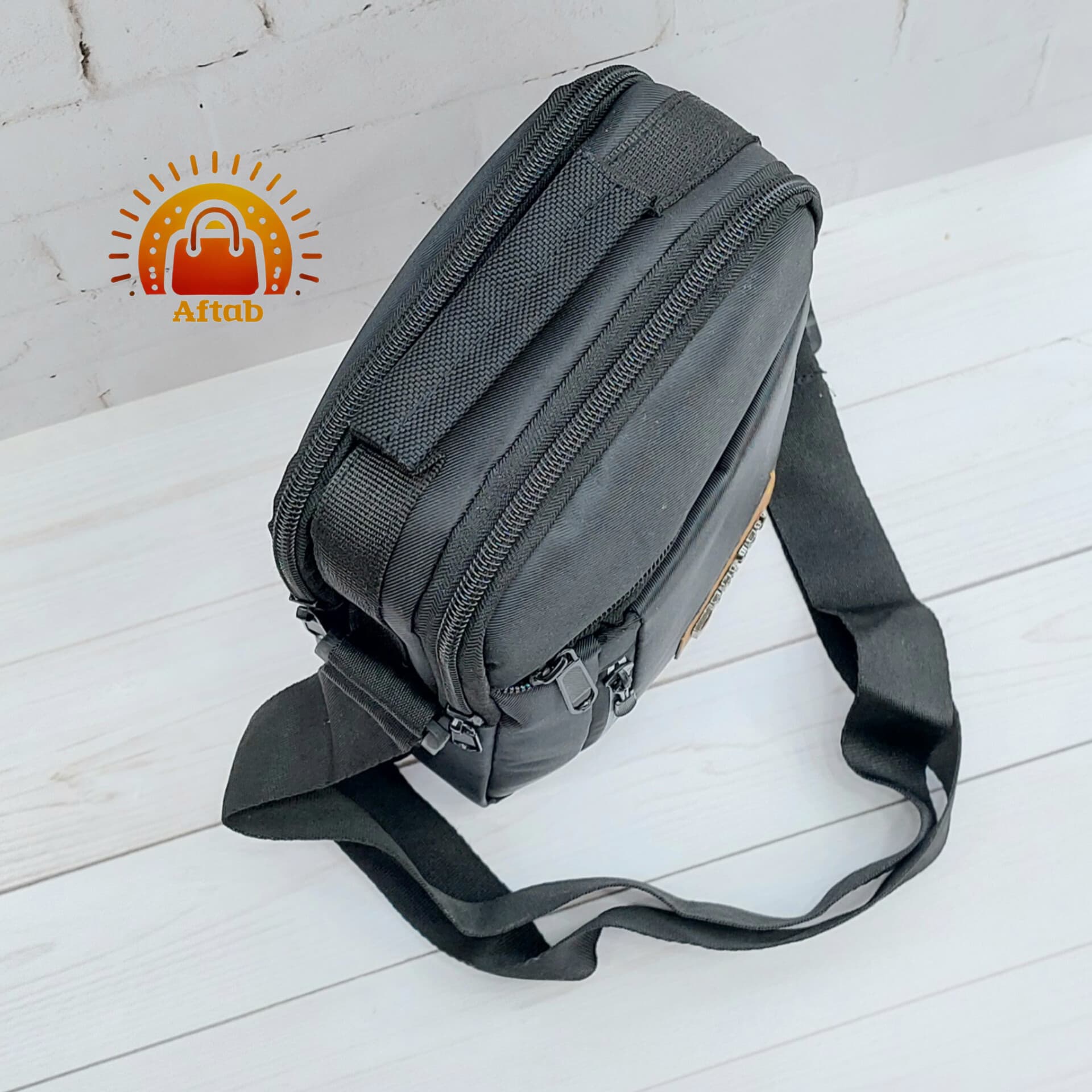 کیف دوشی برزنتی مردانه اسپورت تیکه چرم DELSEY سایز متوسط — تصویر ۸