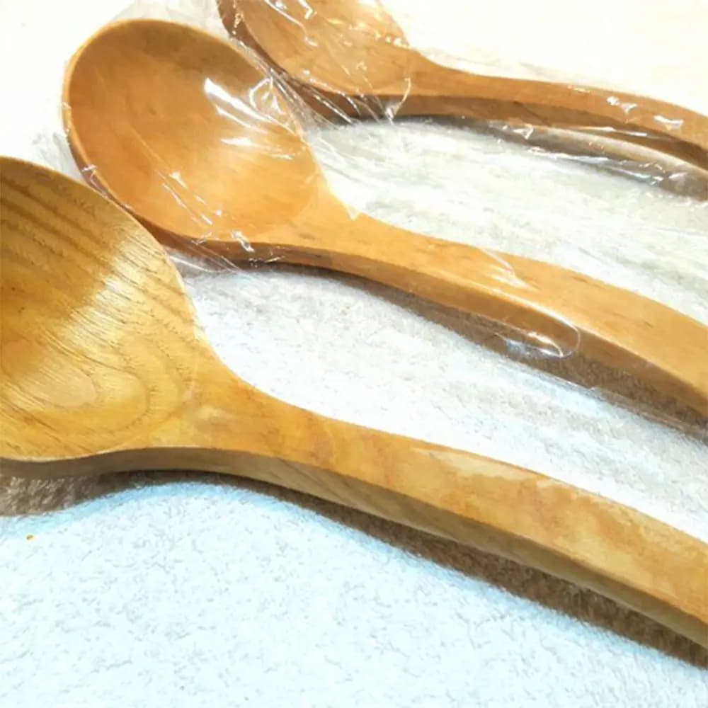 کفگیر چوبی در سه طرح رنگ روشن