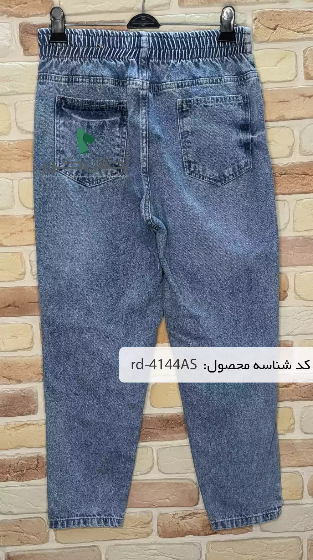 شلوار جین زاپ دار آبی زنانه دست دوم — تصویر ۶