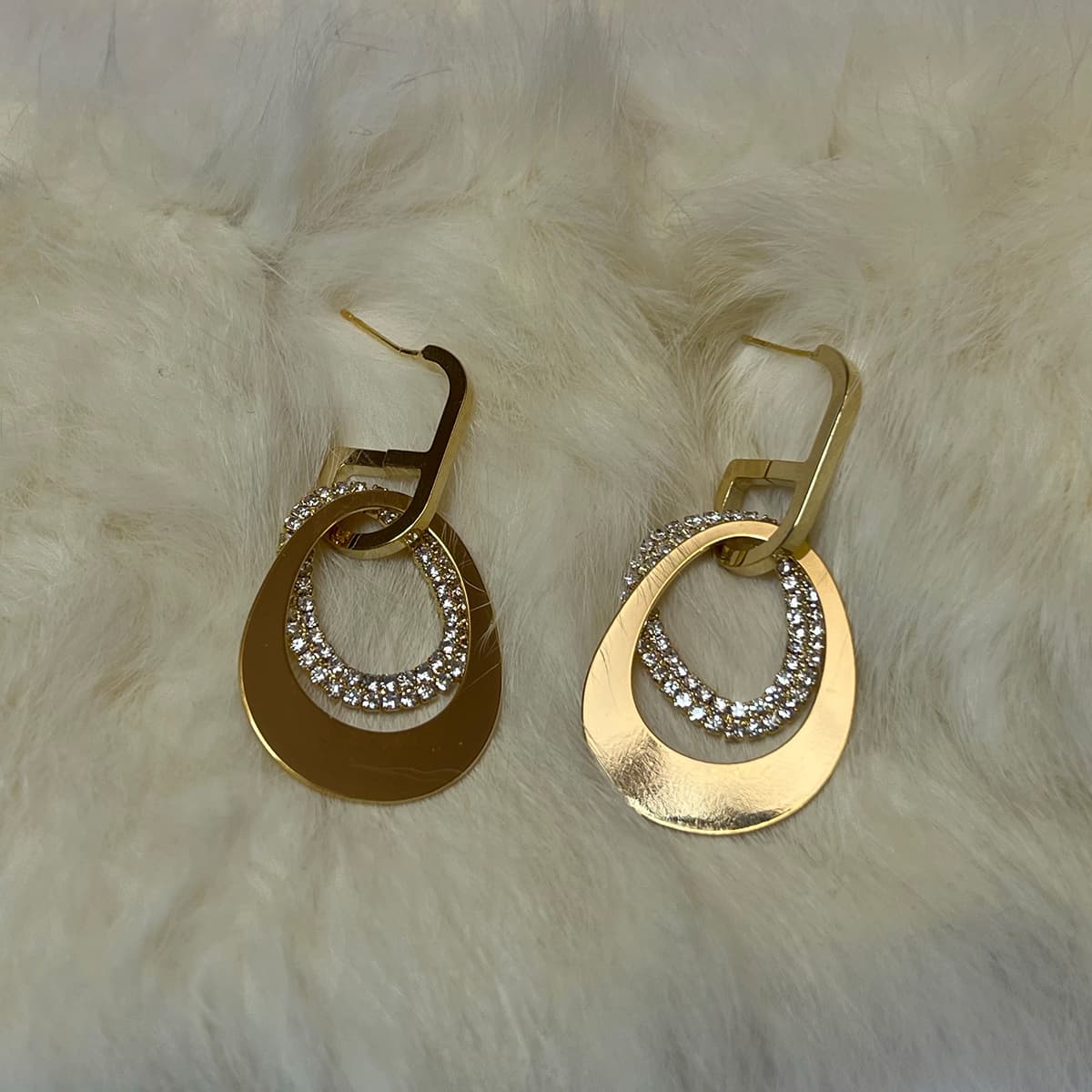 گوشواره بیضی داخل هم طلایی — تصویر ۳