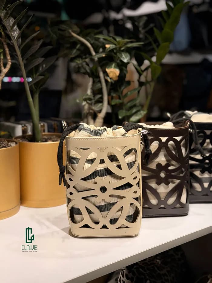 کیف زنانه.دخترانه : لاکچری چرمی طرح دار — تصویر ۷
