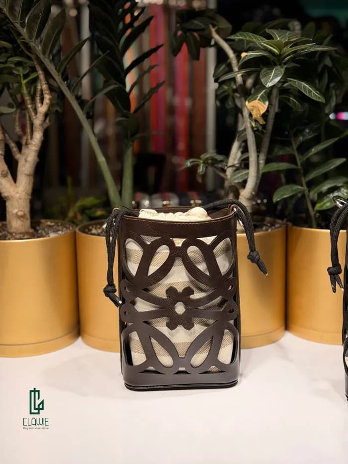 کیف زنانه.دخترانه : لاکچری چرمی طرح دار — تصویر ۶