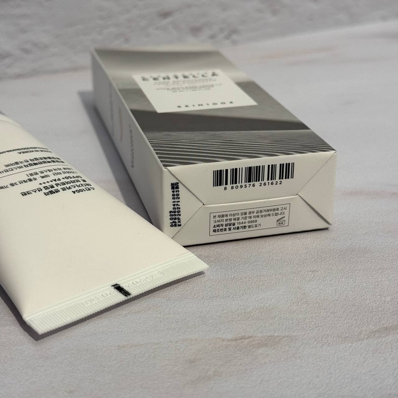 ضد آفتاب تون آپ ضد لک و روشن کننده سنتلا اسکین 1004 50 میل SKIN1004 Centella Tone Brightening Tone-Up Sunscreen — تصویر ۸