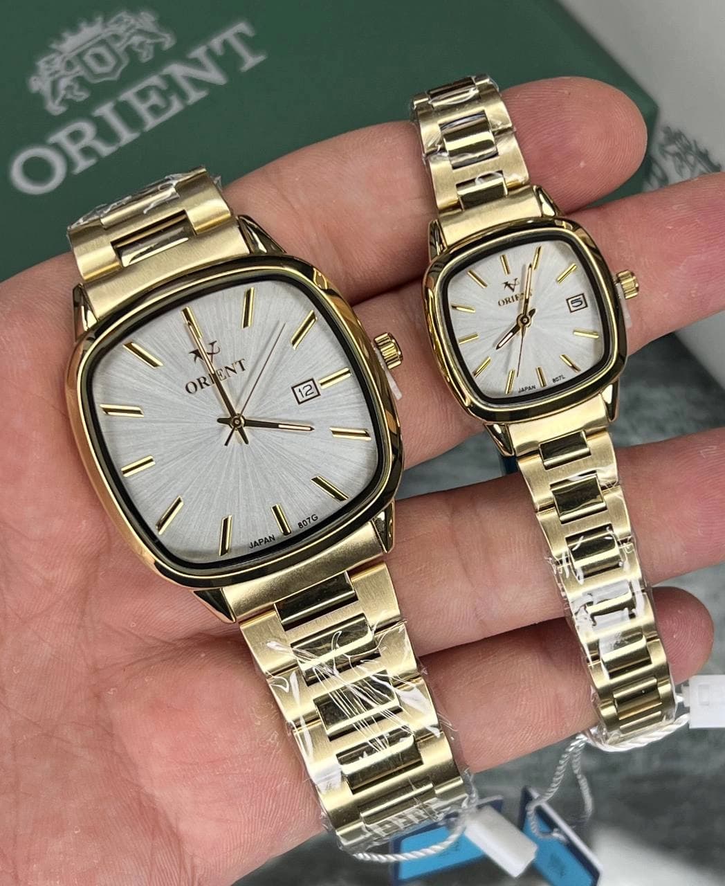 ساعت اورینت Orient V ست زنانه و مردانه مدل 807G.807L رنگ طلایی صفحه سفید