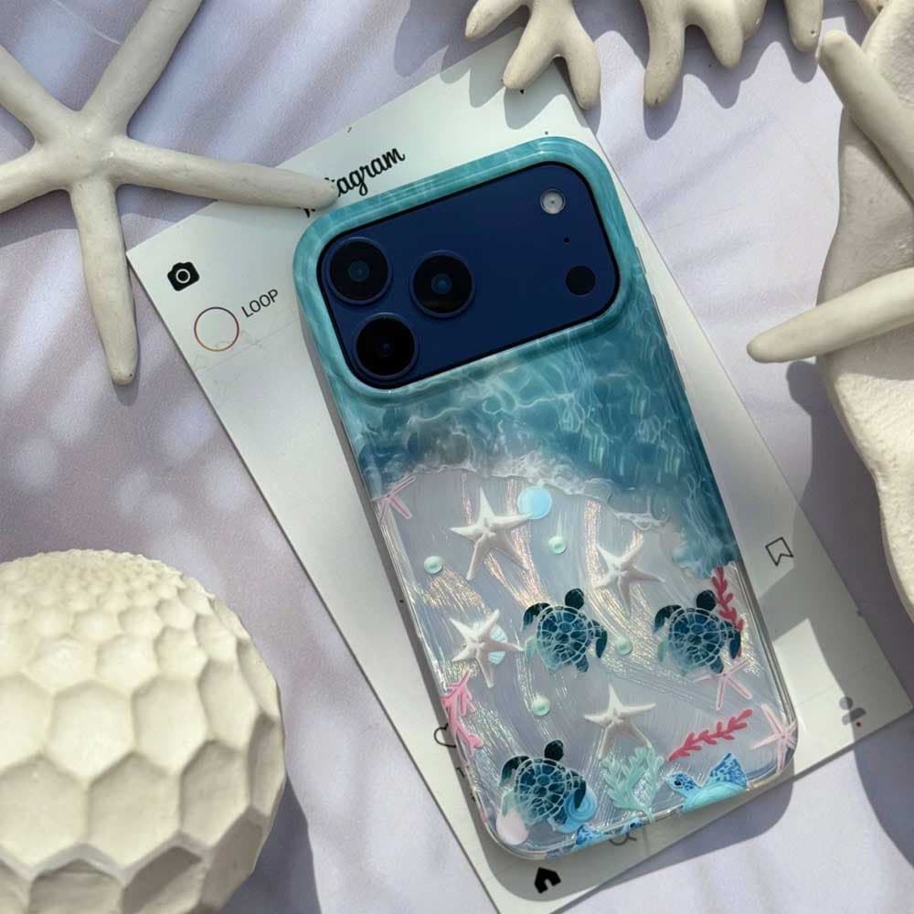 قاب ساحل مدل Imd Beach به همراه آویز کد loop مناسب برای گوشی موبایل آیفون Apple iPhone 13 / 13 Pro / 13 Pro Max / 14 / 14 Pro Max / 15 Pro Max / 16 / 16 Pro / 16 Pro Max / 17 / 17 Pro / 17 Pro Max