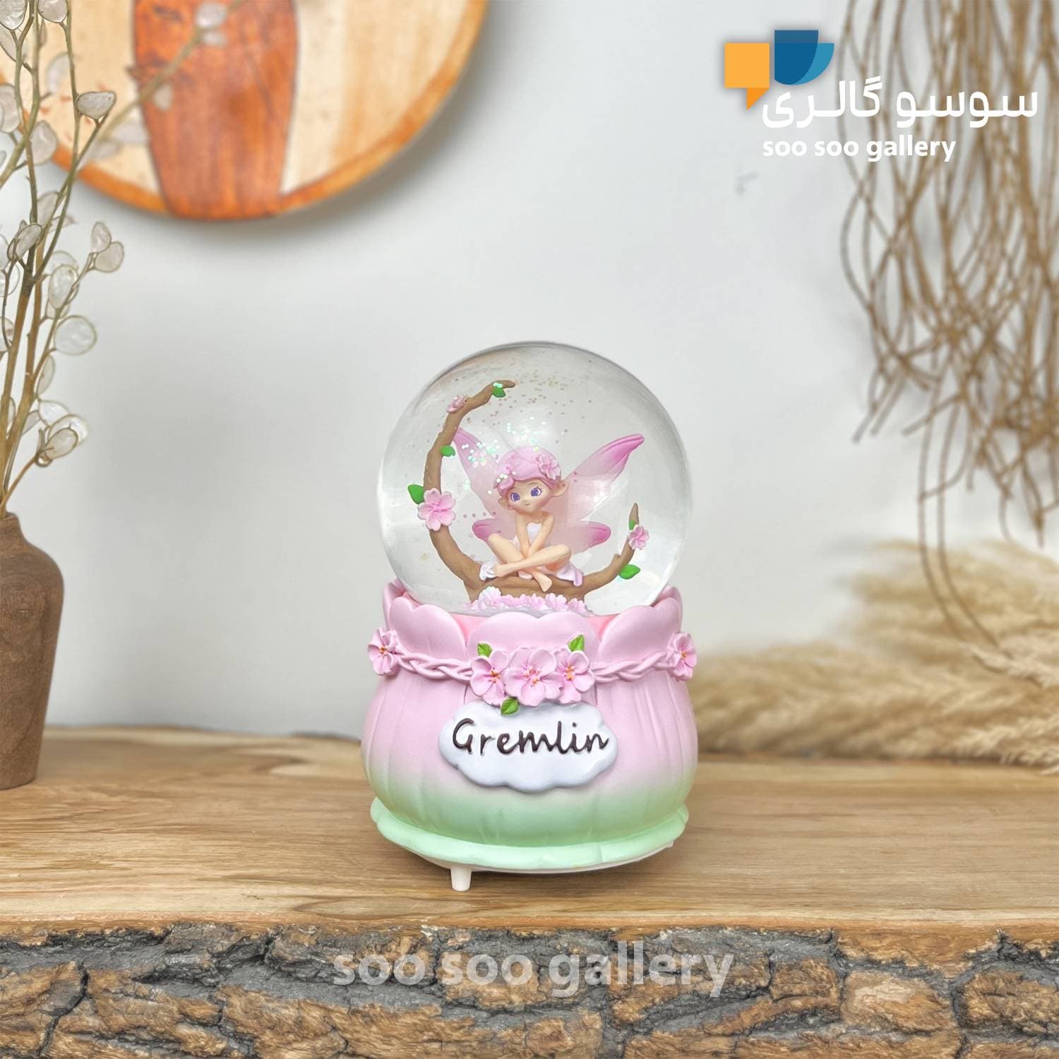 گوی موزیکال دخترانه طرح فرشته بالدار و شکوفه صورتی