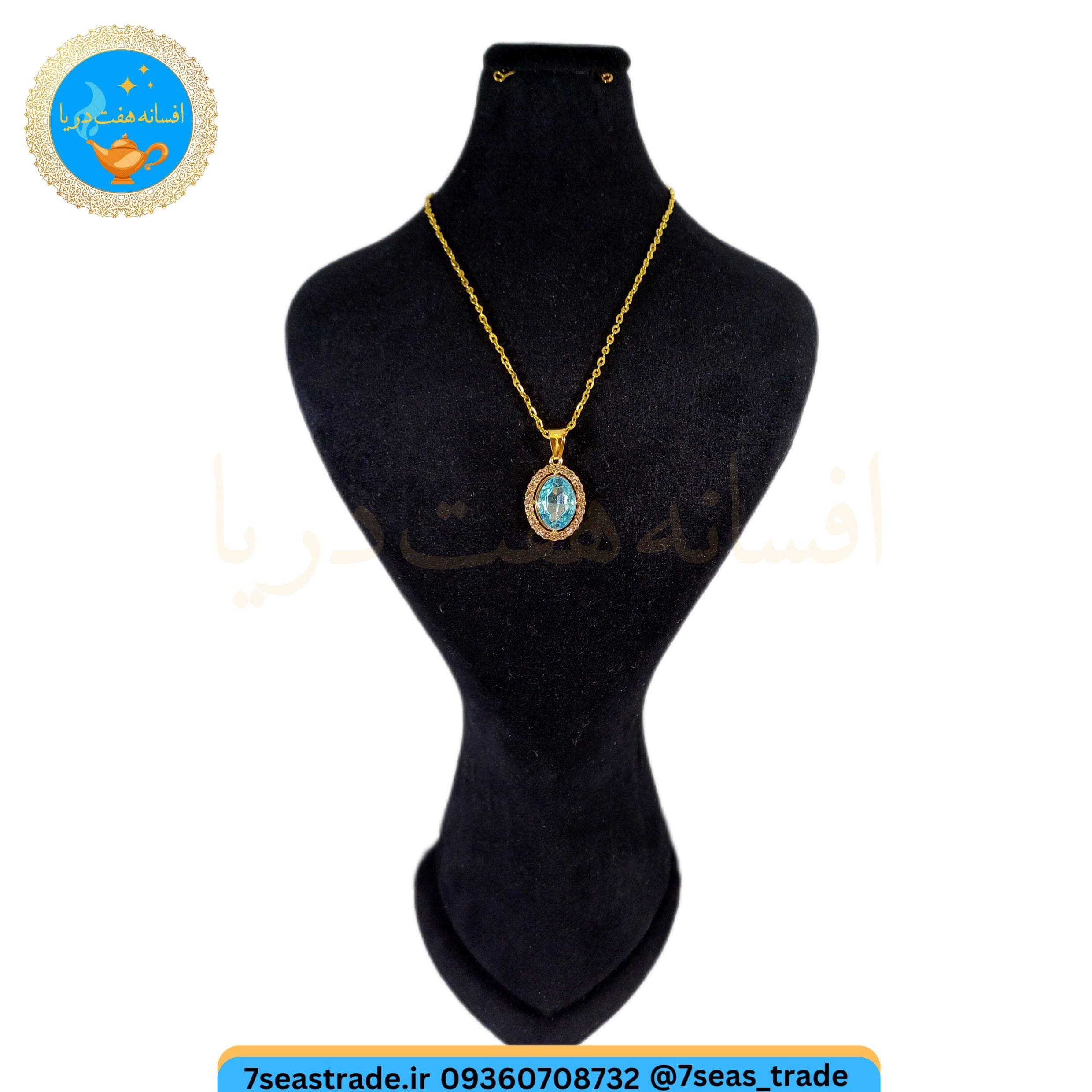 گردنبند زنانه طلایی مدال کریستال بیضی دور نگین شاین مدل آکوامارین