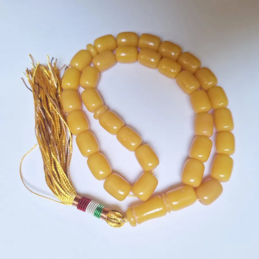 تسبیح سندلوس زرد بودار 33 دانه اصل کد 1405 استوانه‌ای کشیده آقابزرگ — تصویر ۵